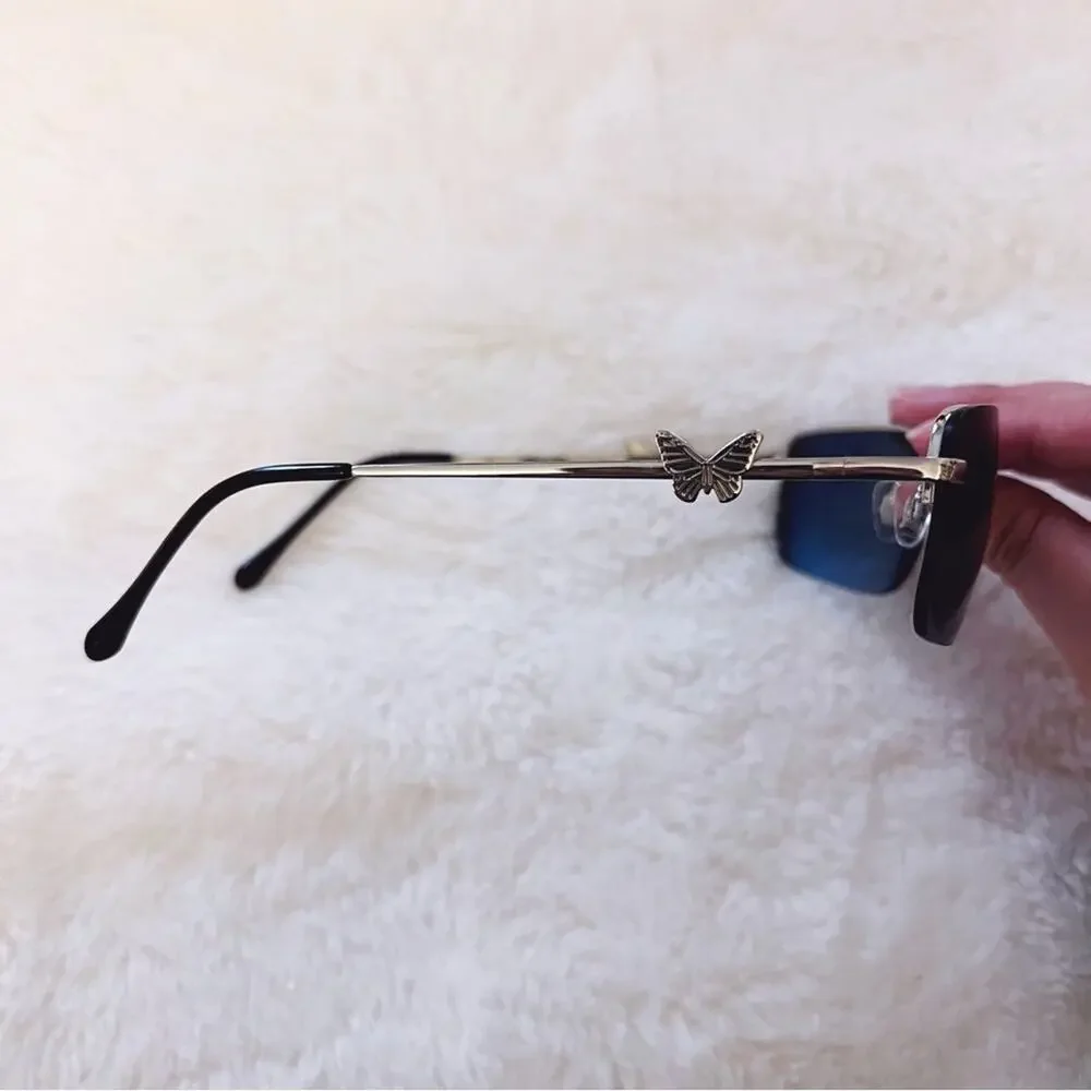 Delia Blue Rimless Butterfly Accent Sunglasses